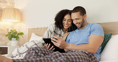 Couple, tablet and laughing in bed, morning and bond with funny video, movie or meme for love, care or hug. Man, woman and digital touchscreen for typing, comic social network or online game in house