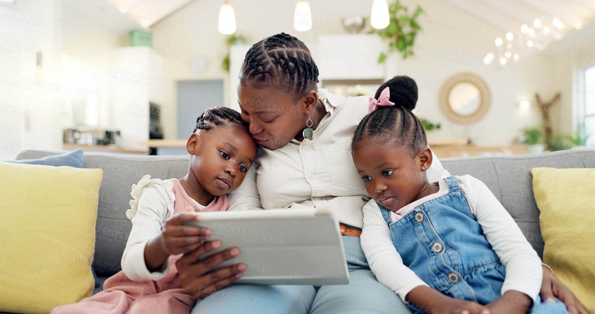 Buy stock photo Happy, mother with her child and tablet on sofa in living room of their home together. Technology or connectivity, happiness or kissing and black family on couch streaming a movie in their house