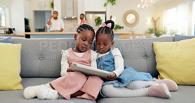 Black girl children, relax with tablet on sofa and elearning or watching cartoon movie, sisters at home and screen time. Young female kids, streaming online and subscription to education app or film