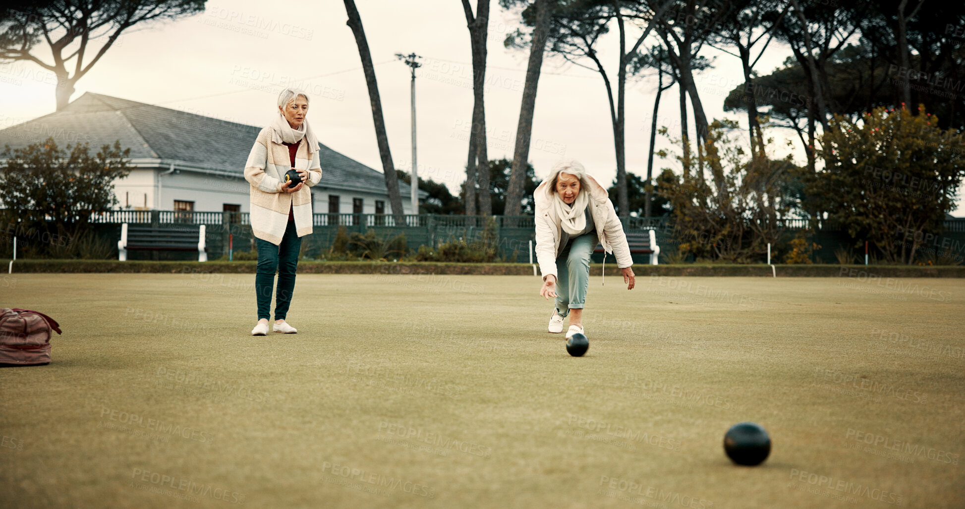 Buy stock photo Women, park or old people bowling for fitness, training or exercise for wellness or teamwork outdoors. Senior ladies, relax or elderly friends playing fun ball game or sport in workout together