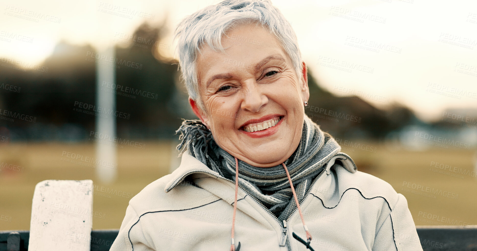 Buy stock photo Face, senior woman and funny on park bench on vacation, holiday or travel in winter. Portrait, happy and elderly person in nature, outdoor or garden for laughing, freedom and retirement in Australia
