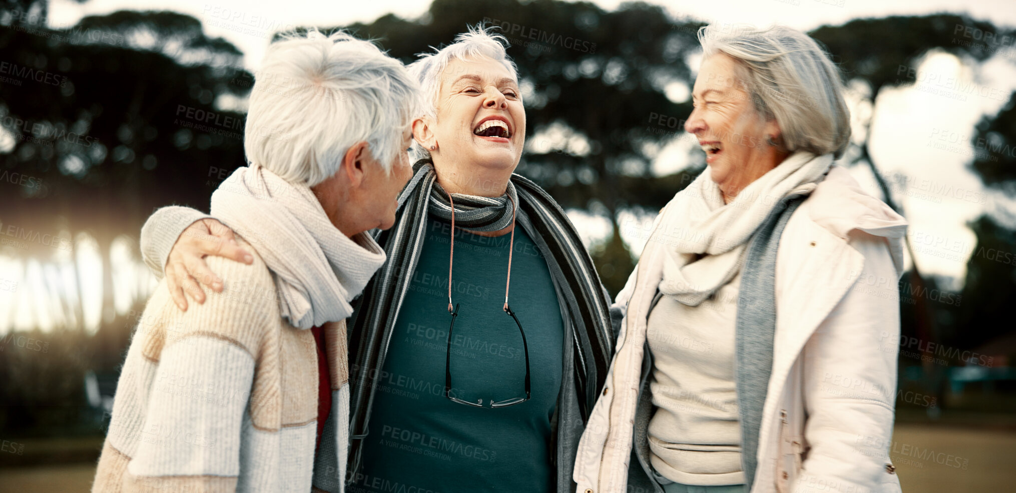 Buy stock photo Talking, funny and senior woman friends outdoor in a park together for bonding during retirement. Happy, smile and laughing with a group of elderly people chatting in a garden for humor or fun