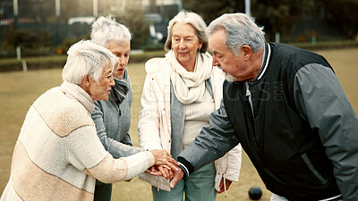 Hands, motivation and senior friends in a huddle outdoor for support, celebration or unity during a game. Teamwork, trust and community with a group of elderly people in a park for team building