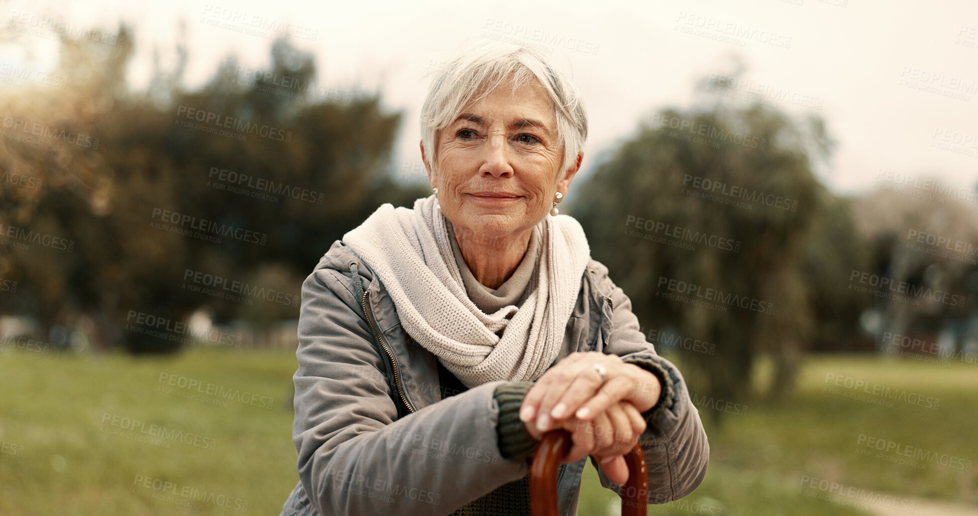 Buy stock photo Nature, cane and senior woman in a park walking for fresh air, exercise or wellness with peace. Calm, smile and elderly female person in retirement with a stick for support at an outdoor garden.