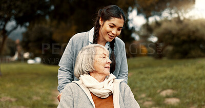 Buy stock photo Senior woman, talking and outdoor with caregiver, nurse or healthcare service for person with a disability and wheelchair. Happy, face and elderly lady in park with care and support in retirement