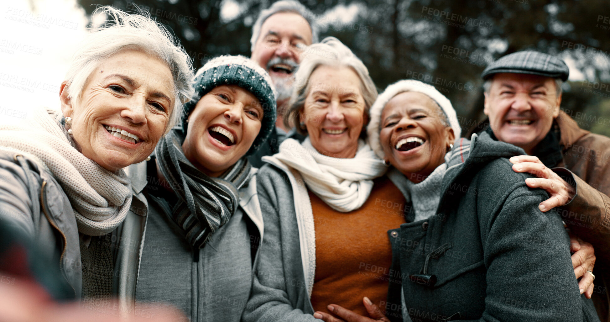 Buy stock photo Happy, selfie and senior friends in a park while walking outdoor for fresh air together. Diversity, smile and group of elderly people in retirement taking picture and bonding in a forest in winter.