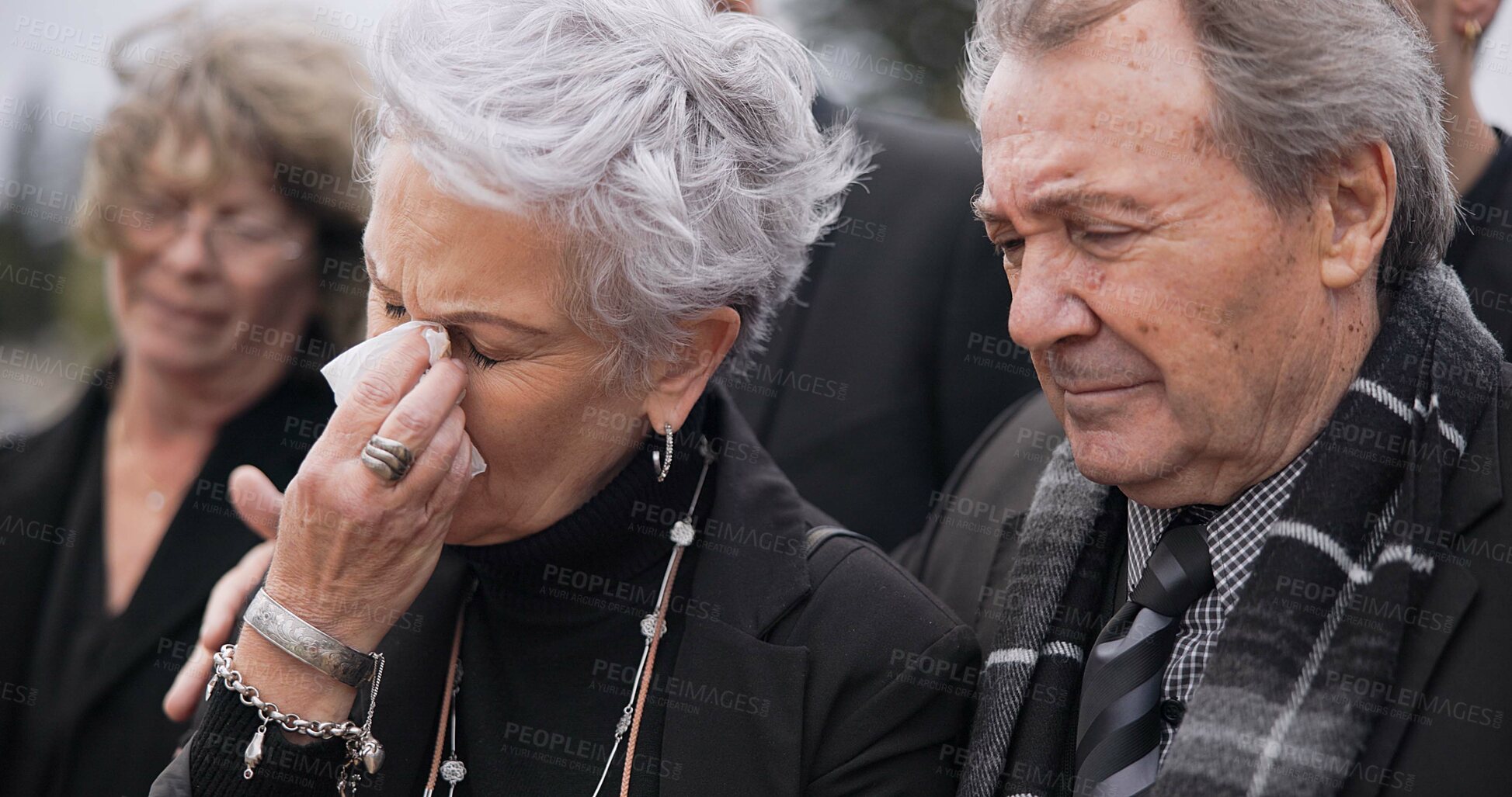 Buy stock photo Death, funeral and senior couple crying together in pain or grief for loss during a ceremony or memorial service. Tissue for tears, support or empathy with an elderly man and woman feeling compassion