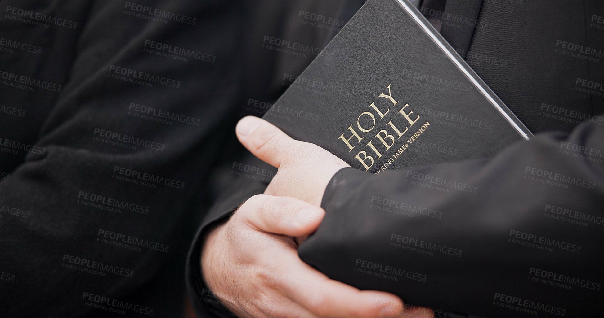 Buy stock photo Bible, funeral and hands closeup of a priest for religion, sad and mourning event in church. Faith, male person and spiritual passage with worship and book for grief with support and condolences
