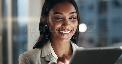 Office tablet, night and face of happy woman typing, scroll or check research, planning or customer experience analysis. Reading report, Indian person and media analyst working on online project