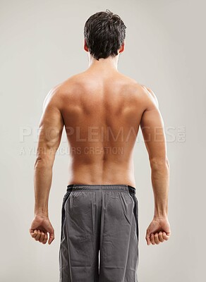 Buy stock photo Back, topless or athlete for fitness results, wellness and health isolated on grey background in studio. Muscle, sports man or model with progress in exercise, workout and training on backdrop alone