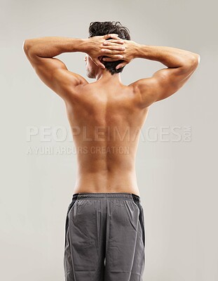 Buy stock photo Back, topless or model for fitness results, wellness and health isolated on grey background in studio. Hands up, man or male person with progress in exercise, workout and training on a backdrop alone
