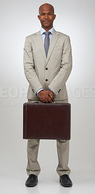 Buy stock photo Black businessman, portrait and briefcase in studio in confidence, happy and finance career in pride. African man, smile face and positive as accountant and corporate professional by white background