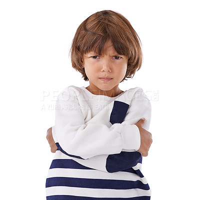 Buy stock photo Boy, child and angry in portrait with arms crossed, frustrated and stress, emotion and frown on white background. Youth, upset or disappointed with tantrum, bad attitude with problem in studio