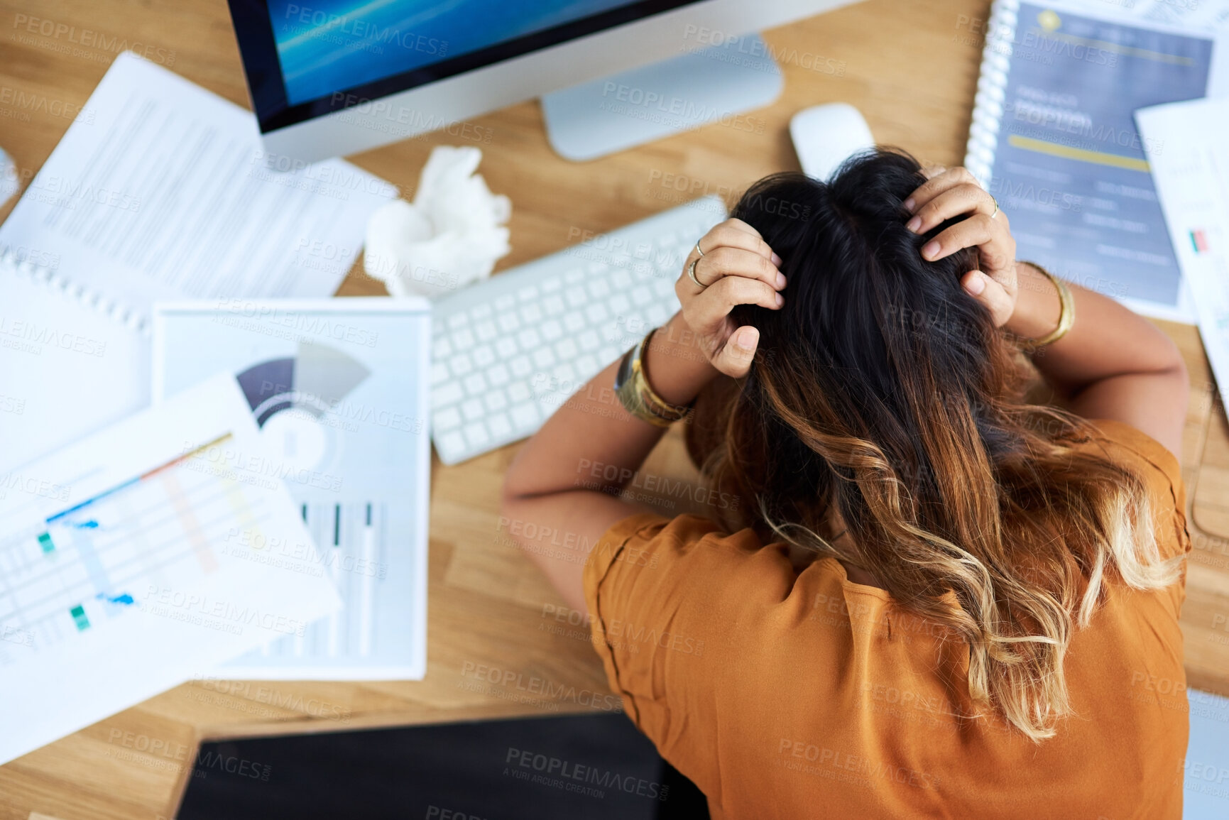 Buy stock photo Cropped shot of an unrecognizable businesswoman suffering from a headache while in her office during the day