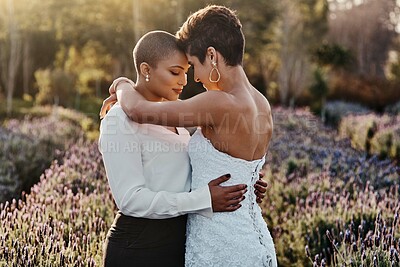 Buy stock photo Married couple, lesbian and hug in embrace for LGBT, gay or transgender relationship in the nature outdoors. Happy women hugging for wedding, marriage or commitment in support for sexuality together