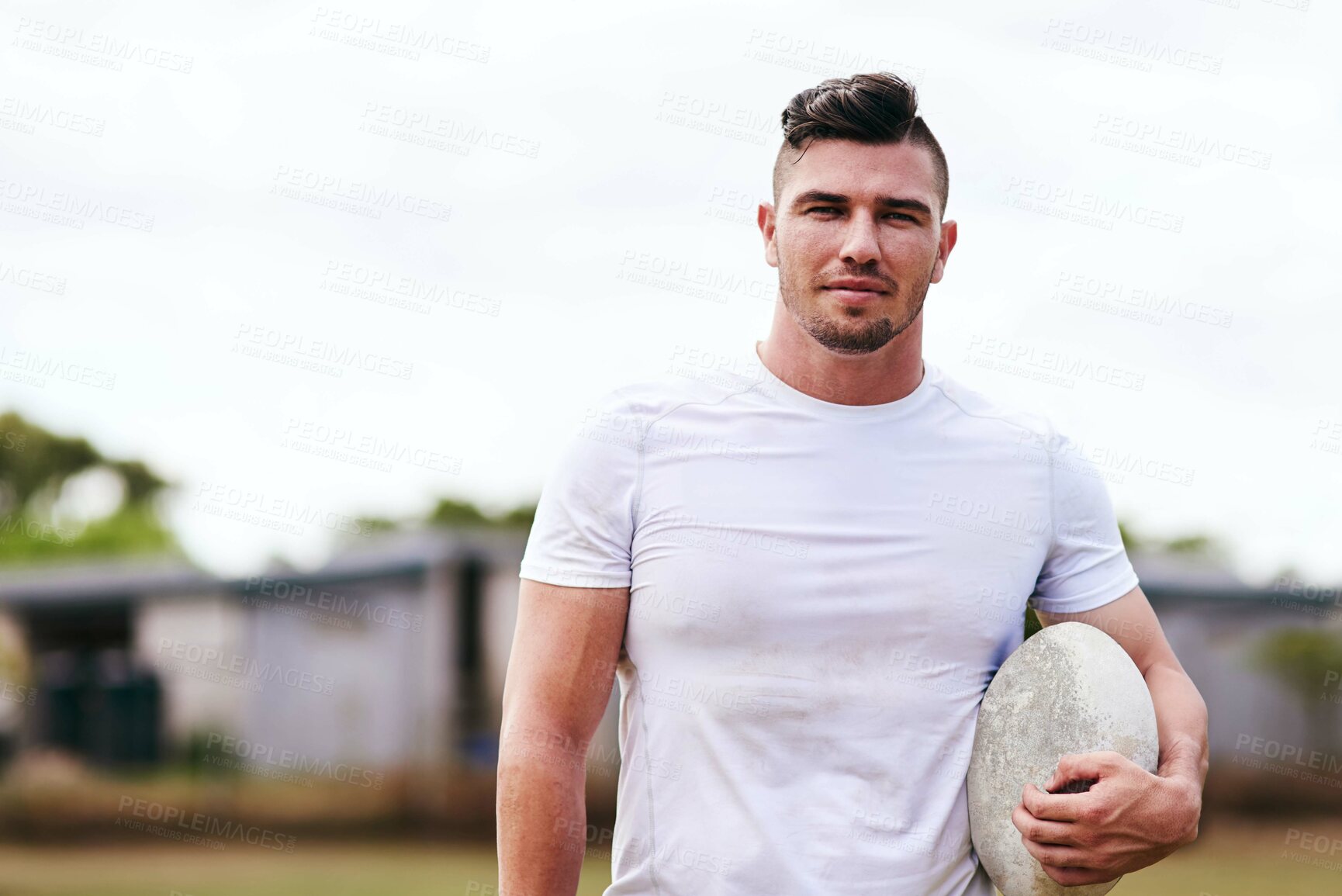 Buy stock photo Portrait of a young man playing a game of rugby