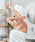 Woman, dancing and happy in bathroom with towel for shower, cleaning and wellness with grooming in home. Person, dancer and smile for skincare, body care and hygiene with cosmetics and healthy glow