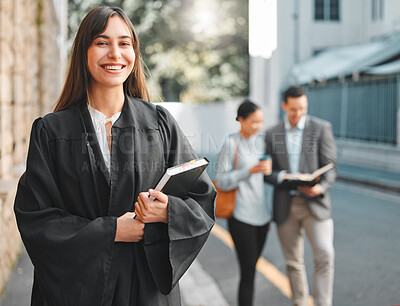 Buy stock photo Lawyer, woman and portrait with book in city for law, justice and human rights with pride for job at court. Attorney, advocate and person with smile, notebook and documentation for evidence in street