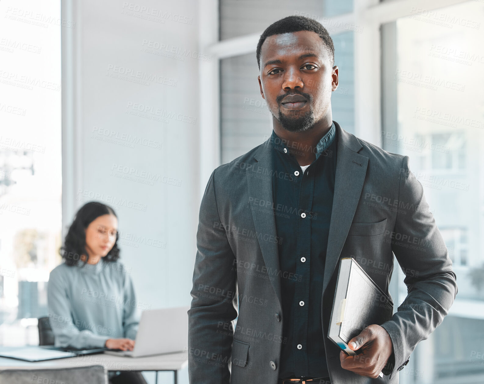 Buy stock photo Businessman, portrait and serious with book in office for corporate knowledge in law and justice learning or study. Legal advisor, african person and face with confidence and pride at workplace