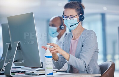 Buy stock photo Sanitize, hygiene and compliance with covid19 regulations at  call center with crm agent cleaning workstation. Woman working in customer service, making sure to leave desk fresh for the next operator