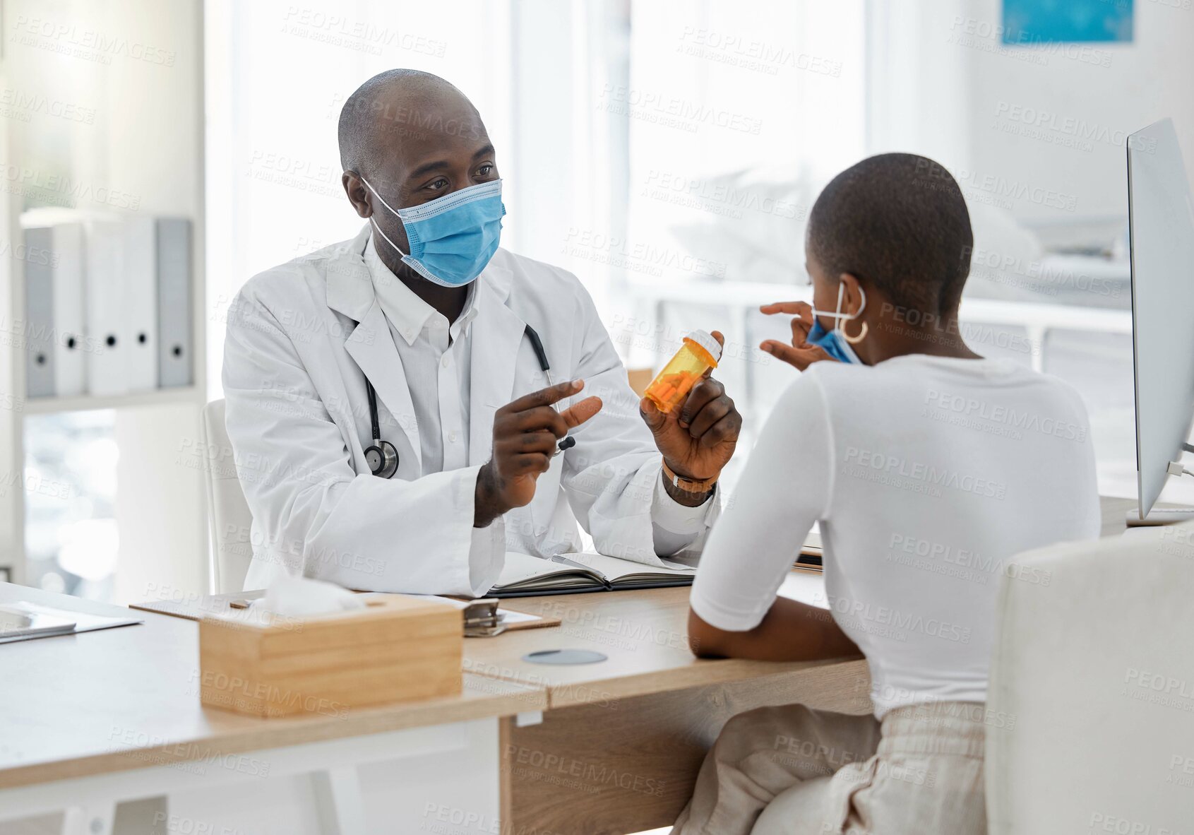 Buy stock photo Doctor talking to covid patient of pills or medication in a hospital or clinic. Trust, help and expert advice on healthcare insurance and gp doc consulting with prescription product and face mask