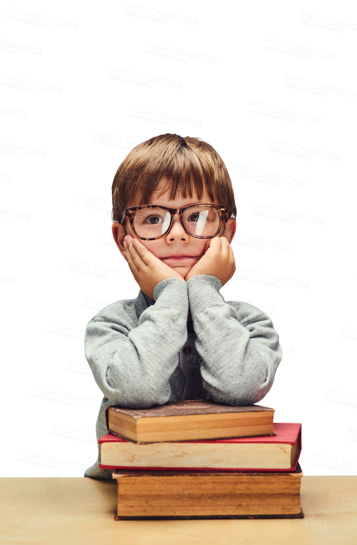 Buy stock photo Little boy, thinking and student with glasses on books for learning or education on a transparent PNG background. Face of young or smart male person, child geek or nerdy kid with textbooks on table