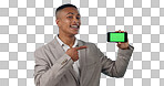 Business man, phone green screen and pointing to presentation, sign up information or trading software in studio. Happy portrait of a young trader on mobile app, tracking markers and blue background