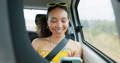 Woman, phone and texting on road trip, car or laugh at meme, comic video and internet for travel. Girl, smartphone and reading in vehicle with funny blog, social network post or story with transport