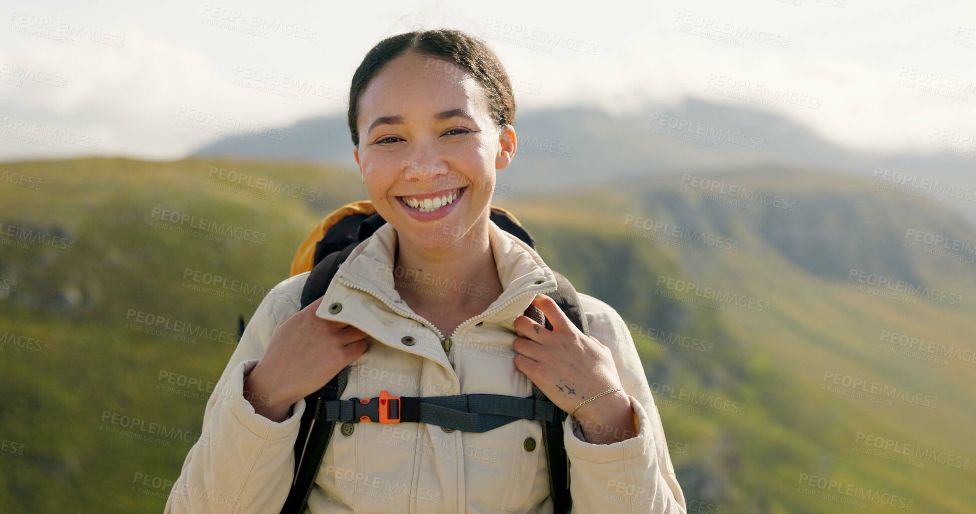 Buy stock photo Happy woman, face and backpack with mountain in nature for hiking, adventure or outdoor journey. Portrait of female person, tourist or hiker smile with bag for trekking or climbing on cliff or hills