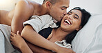 Happy couple, hug in bed and love with intimacy and romance at home for relationship, sex and bonding. Young people, woman and man relax in bedroom, cuddle and laughing with kiss and talking together
