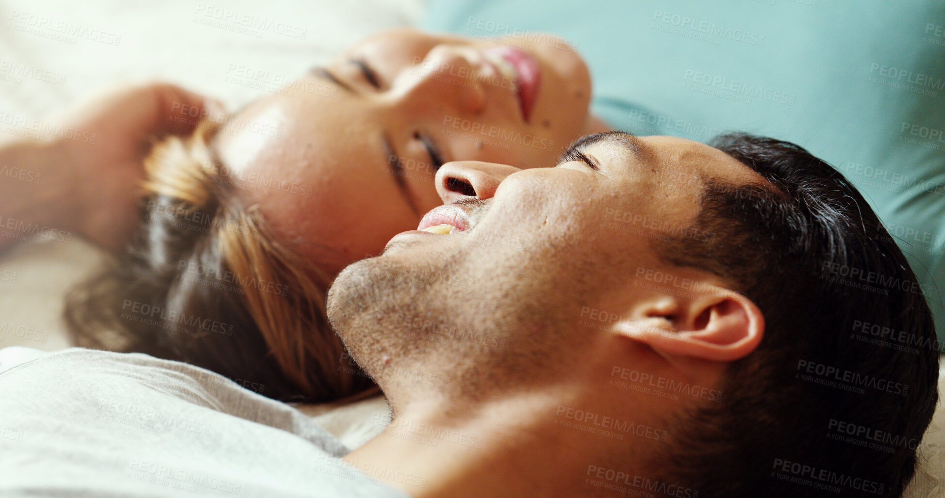 Buy stock photo Couple in bed talking, happy and conversation in the morning. Love, dating and multicultural man and woman speaking, bonding and have a discussion in bedroom. People in a relationship laying together