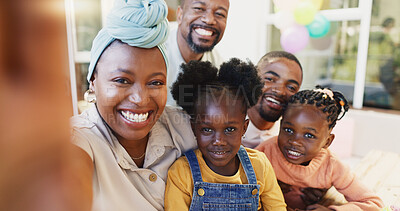 Black family, selfie and a smile of parents and children together for bonding, love and care. Face of an African woman, man and happy kids at home for a picture, quality time and bonding or fun