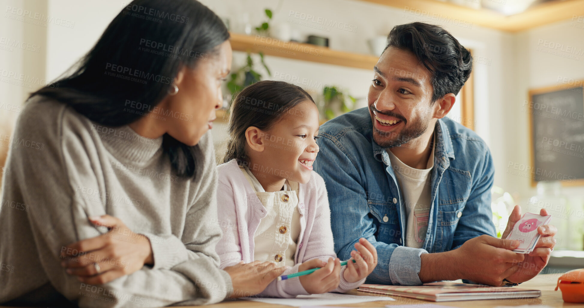 Buy stock photo High five, girl with parents and support with learning in house with card, game or mom and dad helping with homework together in home. Child, family and development of education with math games