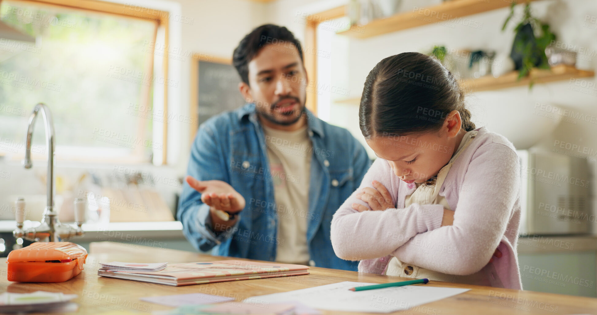 Buy stock photo Angry dad with crying child, homework and scolding in kitchen, helping to study with conflict. Learning, teaching and frustrated father with sad daughter for discipline, education and problem in home