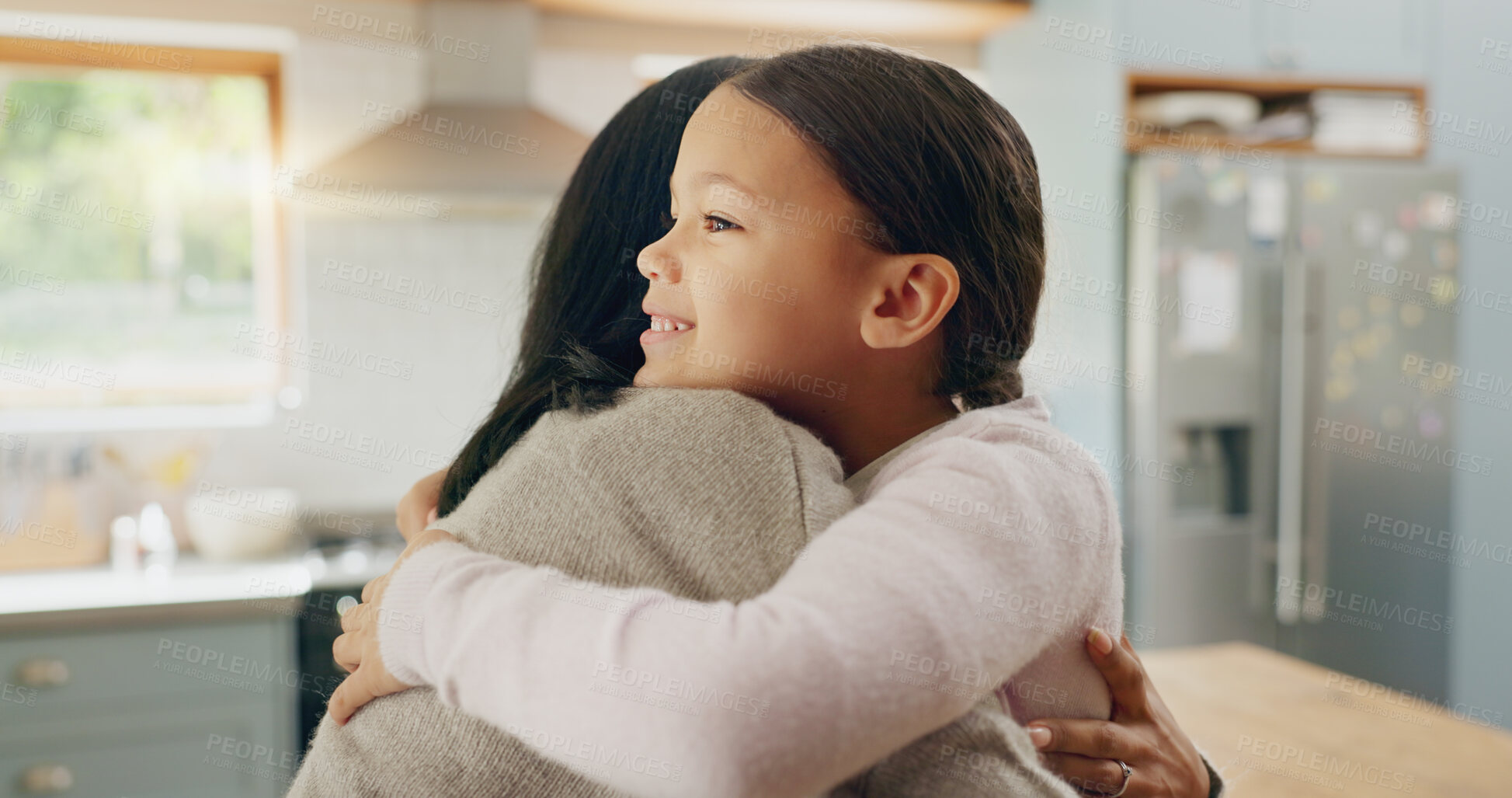 Buy stock photo Love, mom and girl in a hug in family home with support, trust and bonding in kitchen or happy childhood memory of daughter. Smile, face and kid in embrace with mother, woman or together with mommy