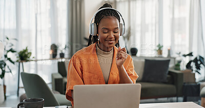 Buy stock photo Laptop, dancing and young woman in the living room listening to music, album or radio of apartment. Technology, smile and young African female person streaming a song on a computer in lounge at home.