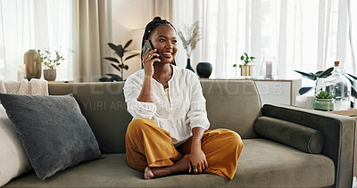 Funny, phone call and black woman on sofa, talking or communication at home. Smartphone, conversation and African person laughing, listening to story and comedy, chat or news and happy in living room