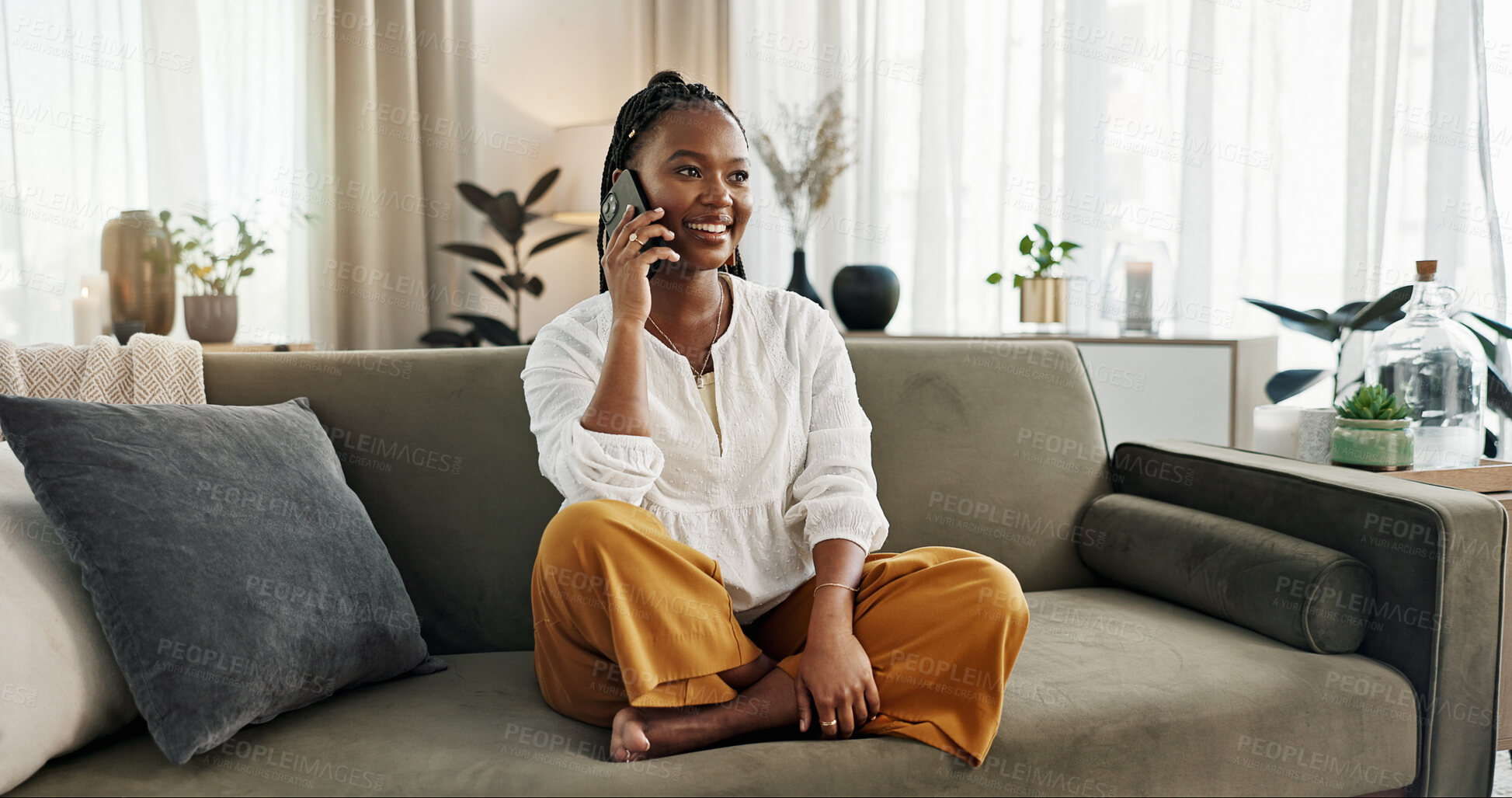 Buy stock photo Funny, phone call and black woman on sofa, talking or communication at home. Smartphone, conversation and African person laughing, listening to story and comedy, chat or news and happy in living room