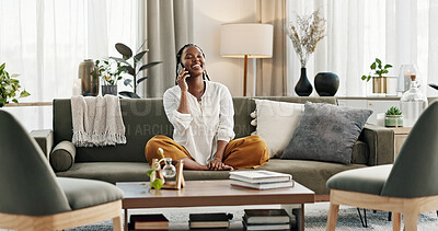 Black woman on sofa, relax and phone call for good news, conversation and connection with smile in home. Happy girl on couch with smartphone, funny discussion and online chat in living room of house