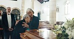 Senior women, hug and funeral in church for comfort, support and care with crying, sad and religion. Family, friends and embrace for death, loss and console with love, empathy and faith by coffin
