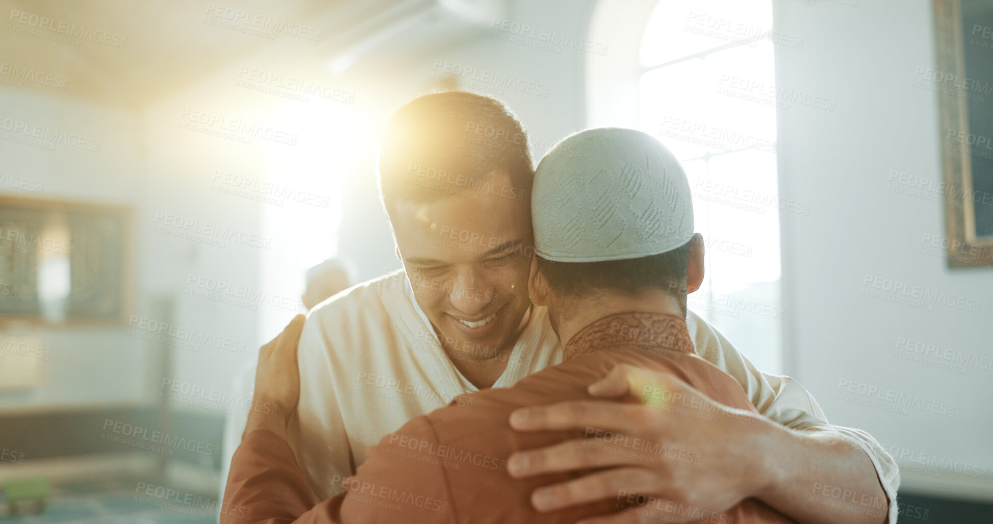 Buy stock photo Muslim, religion and people hug in mosque for community, support and greeting Islamic leader. Holy temple, prayer and men in religious building for Ramadan Kareem, Eid Mubarak and praying together