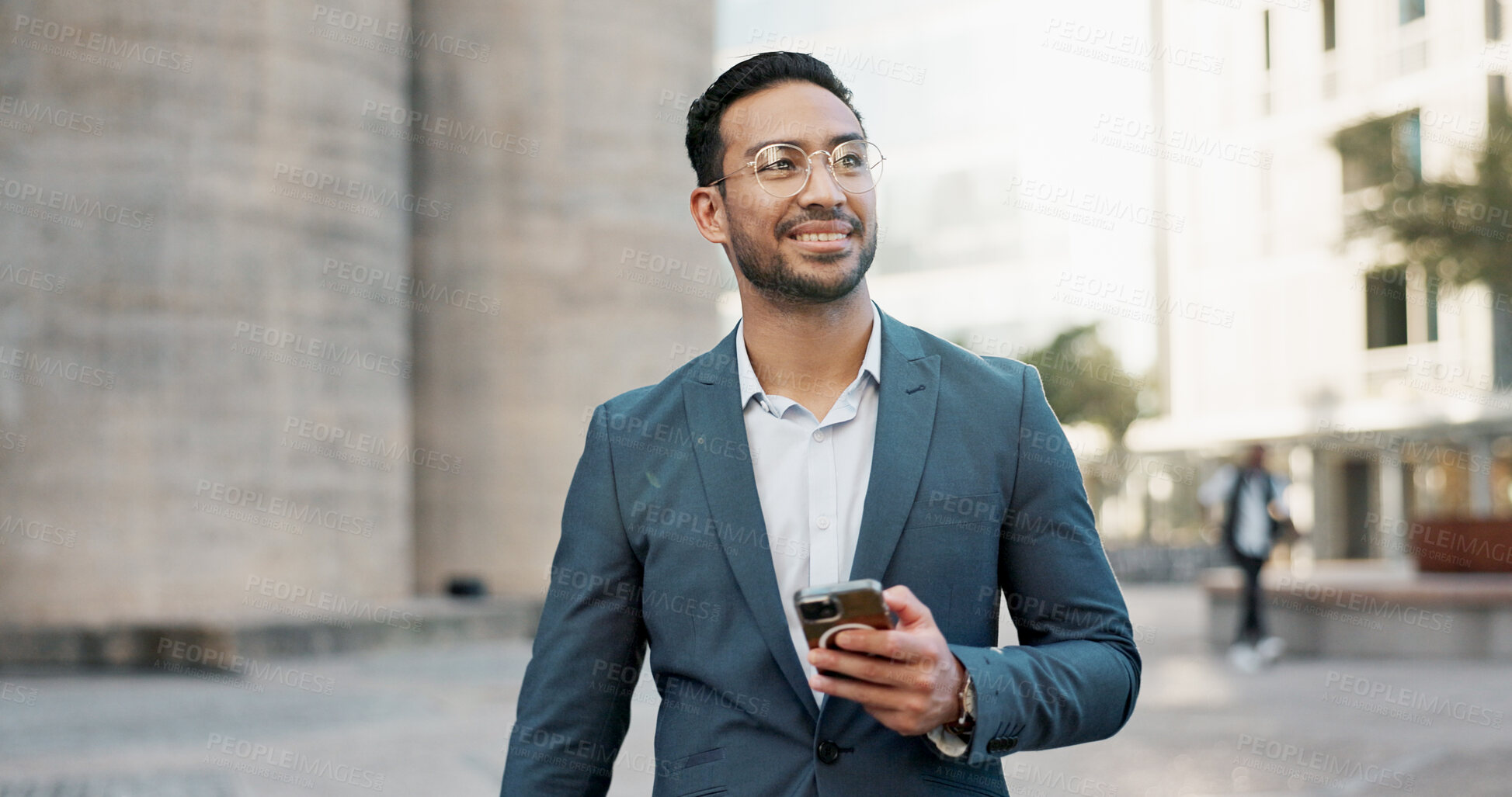 Buy stock photo Asian businessman, mobile message and walking in city, view and confident professional in career by office buildings. Young lawyer, chat and smartphone for connection and technology in cbd in town