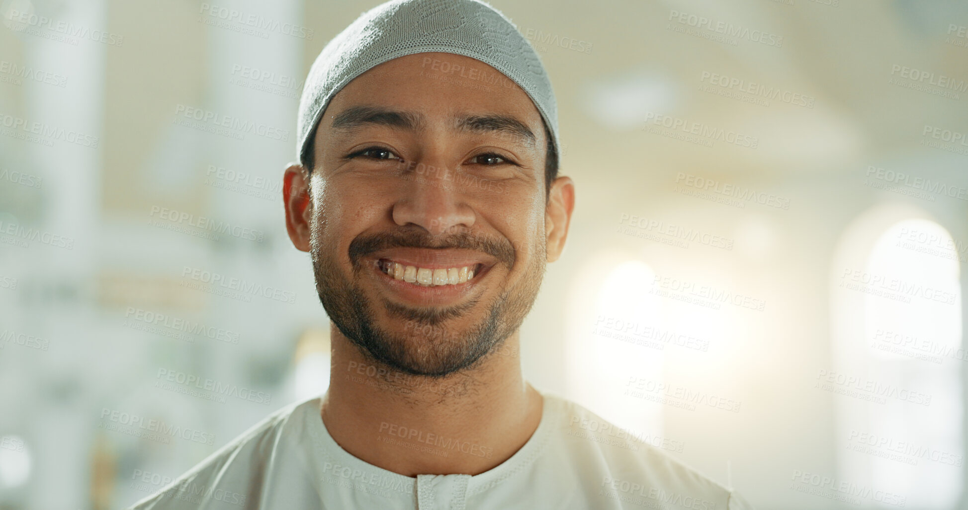 Buy stock photo Face, smile and Muslim man in mosque on lens flare with prayer cap to worship God, Allah and praise. Portrait, happy and Islamic person in temple in hat for faith, culture and funny laugh in UAE.