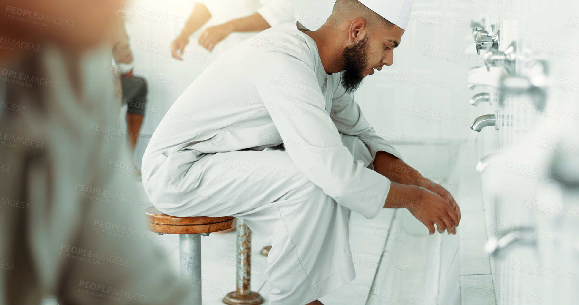 Buy stock photo Muslim, hygiene and men washing before prayer in bathroom for purity, and cleaning ritual. Islamic, worship and faith of group of people with wudu together at a mosque or temple for religion practice