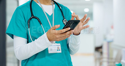 Hands, phone and communication with a nurse scrolling in a hospital closeup for research or networking. Medical, mobile and information with a medicine professional reading a text message in a clinic