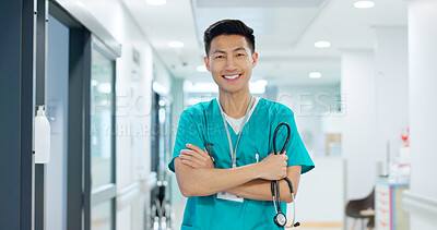 Medical, face and asian man or doctor with stethoscope for wellness, trust and service in hospital or clinic. Portrait, person and expert with happiness for career, cardiology or nursing at workplace
