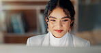 Happy woman at desk with computer, thinking or typing email, report or article at digital agency. Internet, research and businesswoman at tech startup with online review, networking project and smile