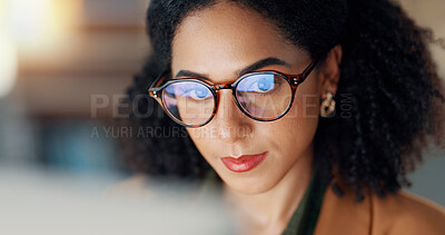 Buy stock photo Happy woman at desk with computer, glasses and reflection, reading email or article at digital agency. Internet, research and thinking, girl at tech startup with online report or networking project.