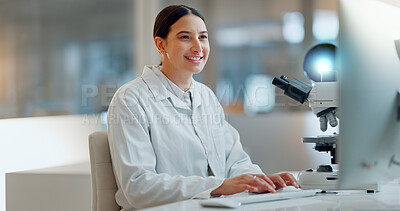 Science, research and happy woman with computer, typing and biotech data report in laboratory. Medical innovation, scientist or lab technician in study in healthcare, medicine or online test feedback