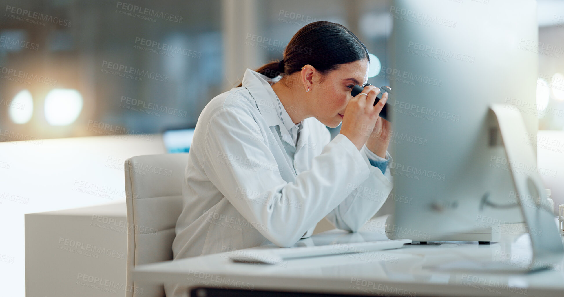 Buy stock photo Science, research and woman with microscope, computer and typing data report in laboratory. Medical innovation, scientist or lab technician in study for healthcare, medicine and vaccine test feedback